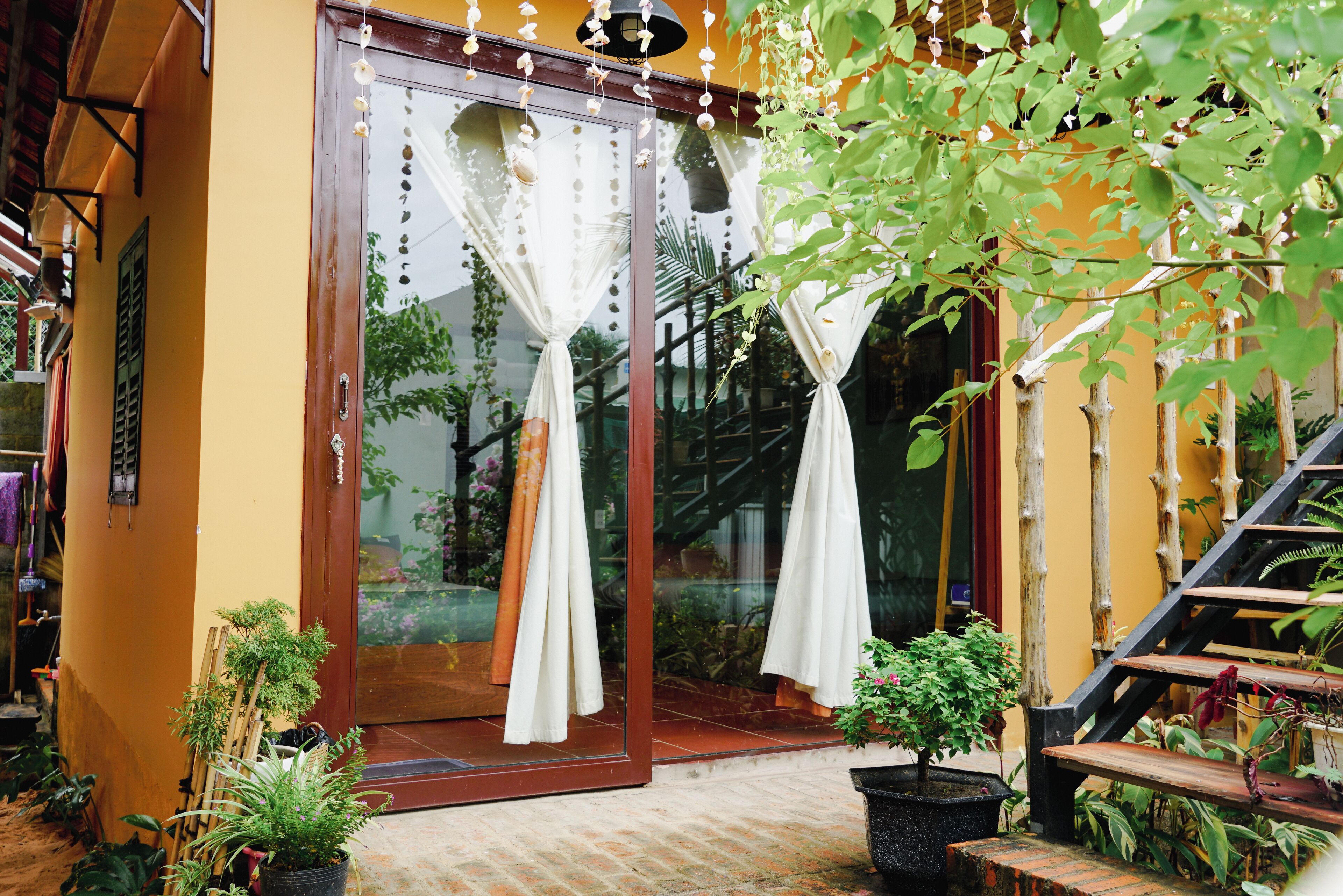 Family Room, 2 Queen Beds, Private Bathroom, Garden View | Terrace/patio