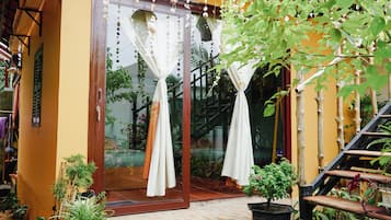 Family Room, 2 Queen Beds, Private Bathroom, Garden View | Terrace/patio