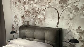 1 dormitorio, tabla de planchar con plancha, wifi y ropa de cama