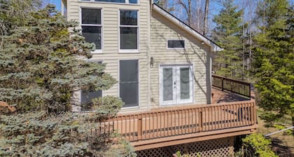 Spacious forest retreat with hot tub, game room, pond, & cozy charm—perfect for family getaways!