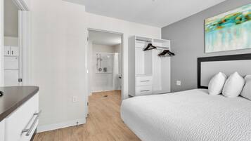 1 bedroom, desk, iron/ironing board, travel crib