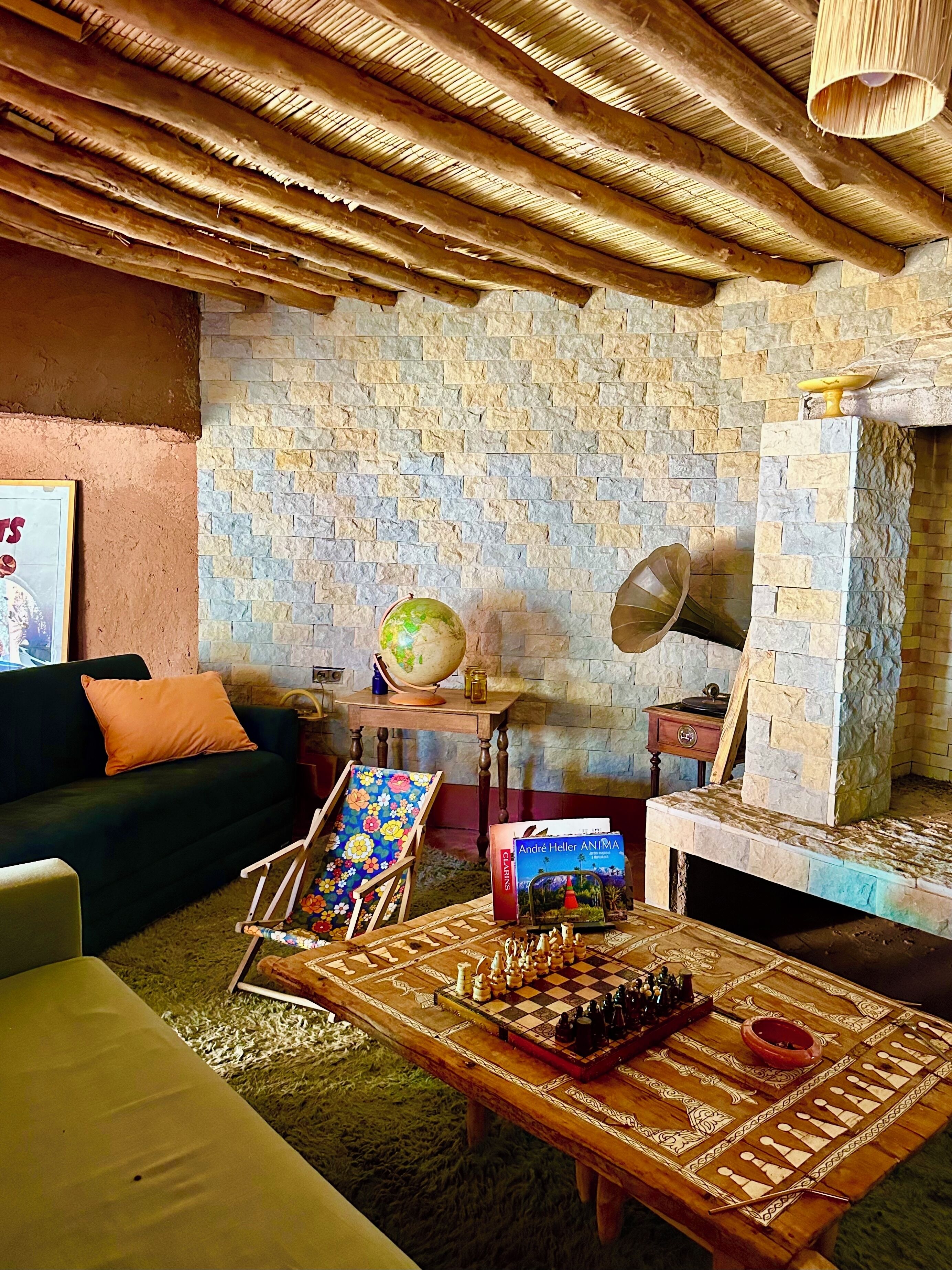 Fireplace, books, stereo, computer monitors