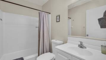 Hair dryer, towels, soap, shampoo
