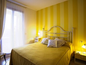 1 dormitorio, tabla de planchar con plancha, wifi gratis y ropa de cama