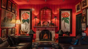 Chambre Double Deluxe, patio, vue jardin | Coin séjour