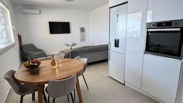 Two-Bedroom Apartment With Sea View & Private Pool | Dining room