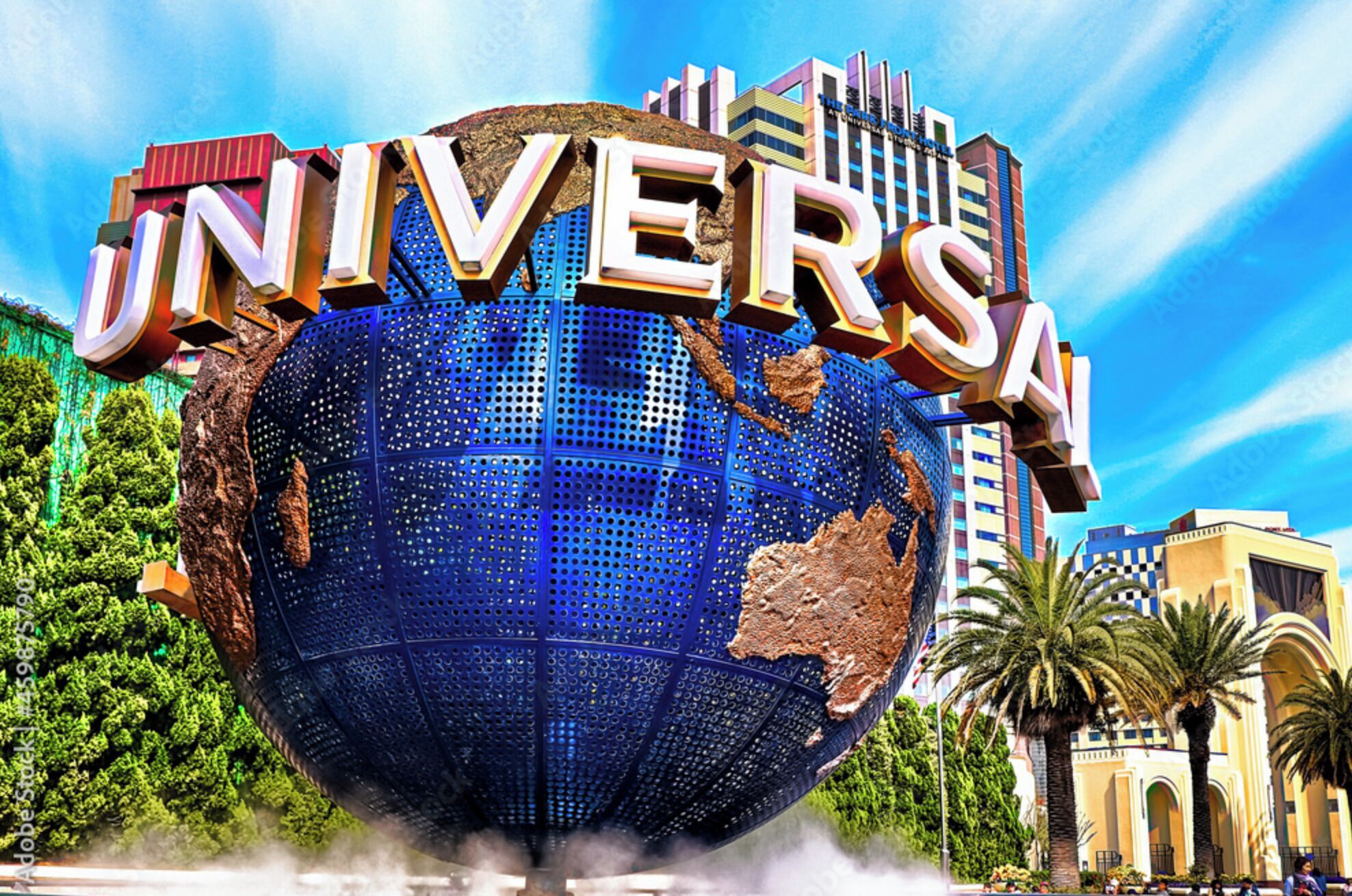 A globe with the word "UNIVERSAL" on it, surrounded by buildings and palm trees.