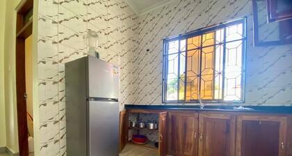 Stay with us in beautifully house few minutes from Julius Nyerere Airport