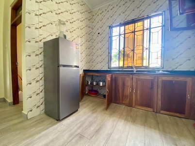 Stay with us in beautifully house few minutes from Julius Nyerere Airport