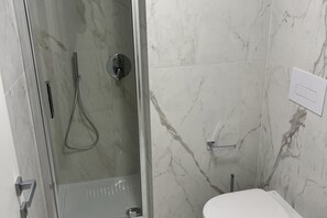 Shower, hair dryer, bidet, shampoo