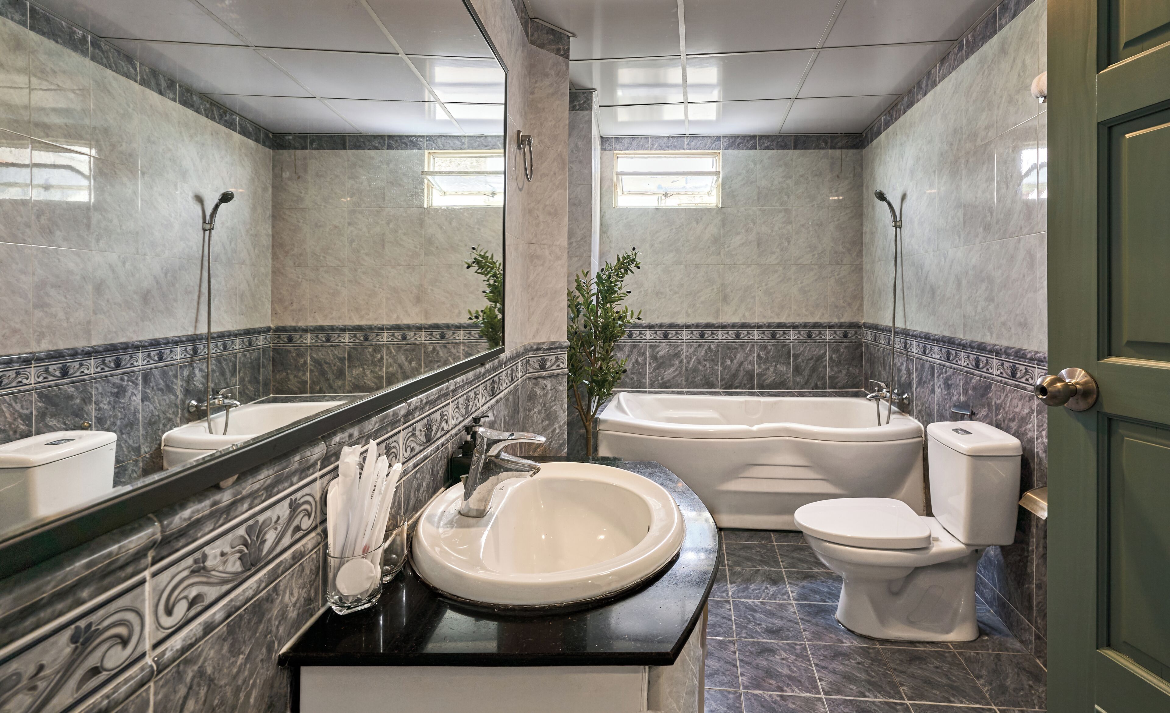 Family Room | Bathroom | Rainfall showerhead, hair dryer, slippers, towels