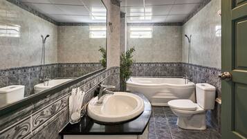 Family Room | Bathroom | Rainfall showerhead, hair dryer, slippers, towels