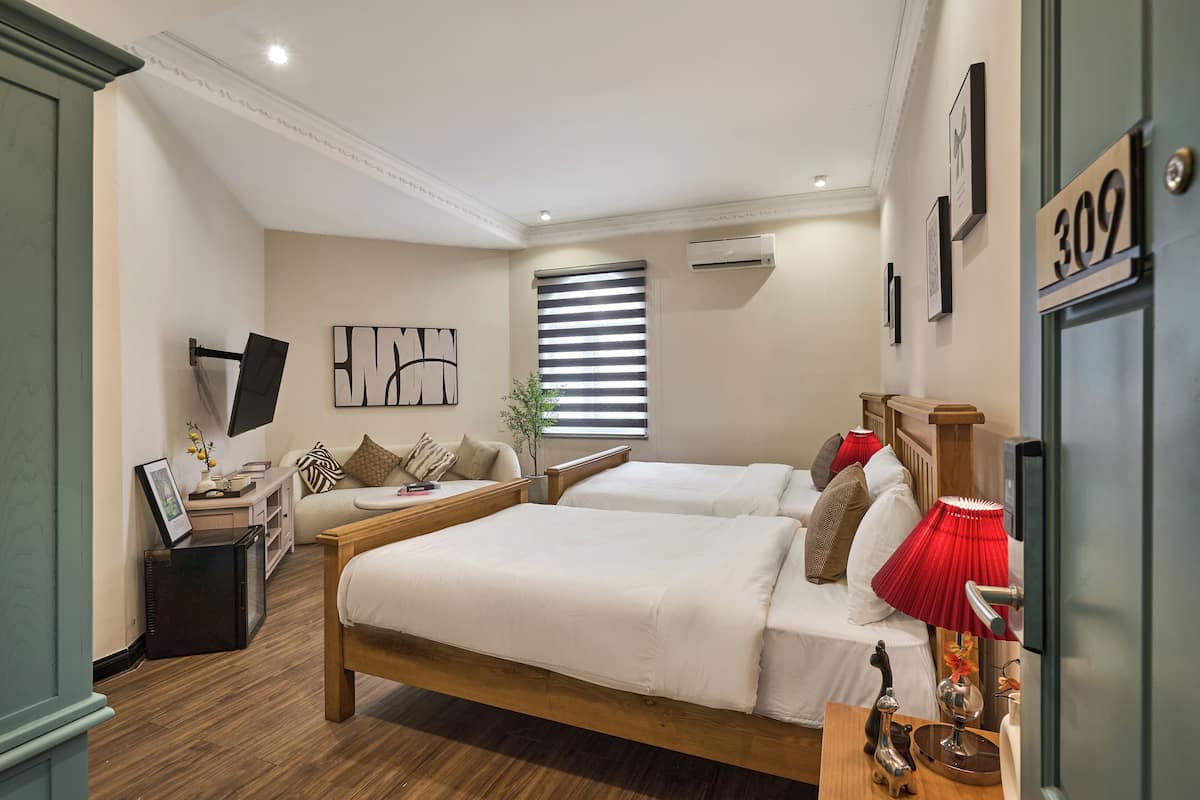 Family Twin Room, Multiple Beds, Non Smoking, City View | 1 bedroom, desk, laptop workspace, blackout drapes