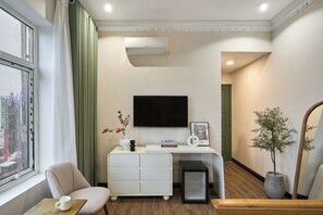 Desk, laptop workspace, blackout curtains, free WiFi