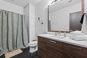 Hair dryer, towels, soap, toilet paper