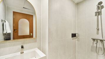 Standard Double Room | Bathroom | Shower, hair dryer, towels, soap