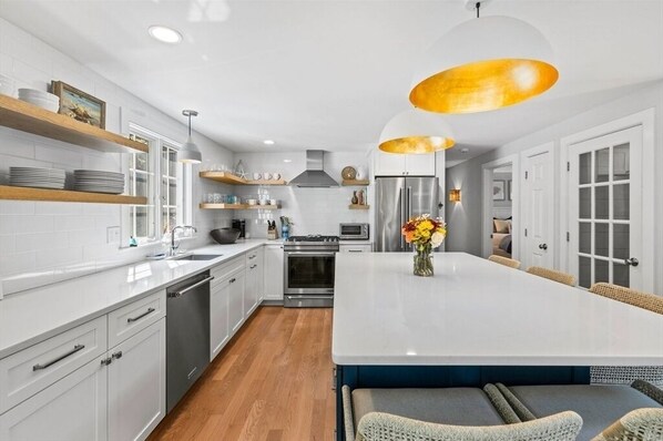 Microwave, stovetop, dishwasher, coffee/tea maker