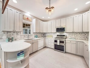 Microwave, stovetop, dishwasher, coffee/tea maker