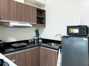 Een magnetron, een oven, een kookplaat