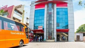A building with an ATM and a food court. - Neeta's Sagar Inn (Lonavala)