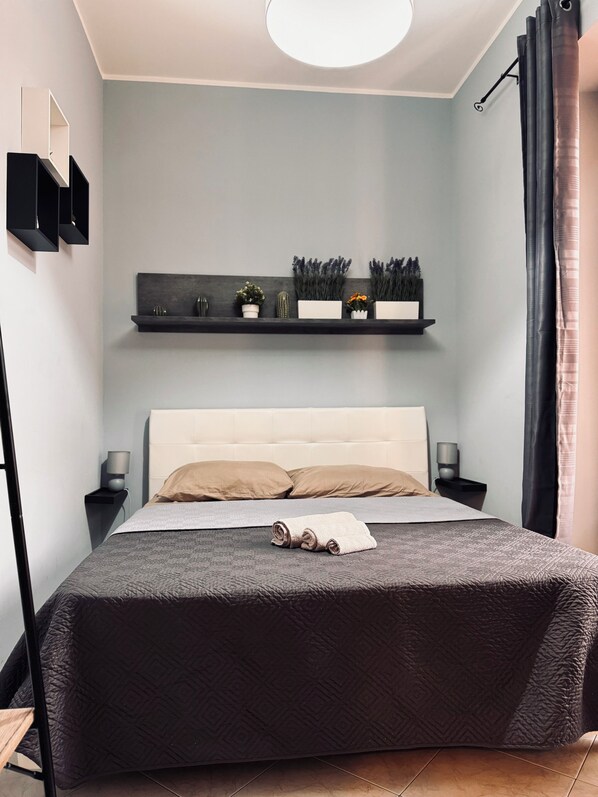 2 habitaciones, tabla de planchar con plancha, wifi y ropa de cama