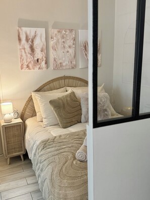 Iron/ironing board, travel crib, free WiFi, bed sheets