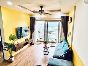 Appartement Luxe, vue plage | Coin séjour