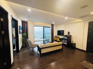 Luxury Apartment, Beach View | Living area | Toys - Sapphire Homestay Ha Long Bay (Ha Long)