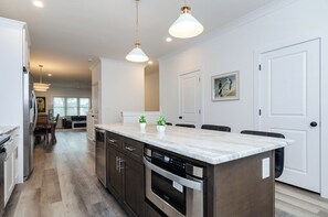 Fridge, microwave, oven, stovetop - Sea Ray: New 4 Bed, 3 Bath Duplex Townhome with Elevator (Carolina Beach)