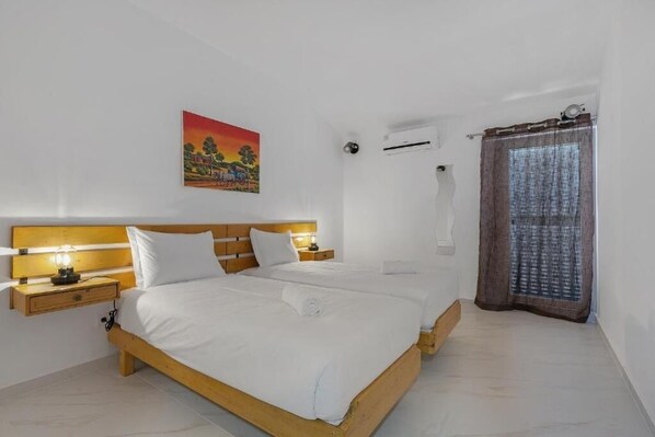 3 عدّة غرف نوم ومكواة/لوح كي وواي فاي وملاءات أسرّة