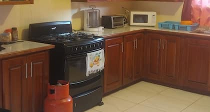 Charming Piarco Home With Garden View