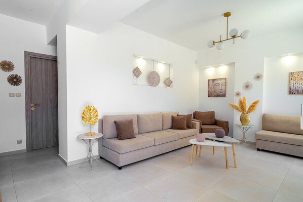 Apartment, 2 Bedrooms, Patio | Living area | Smart TV - Sueño Seaside Residence (Agia Pelagia)