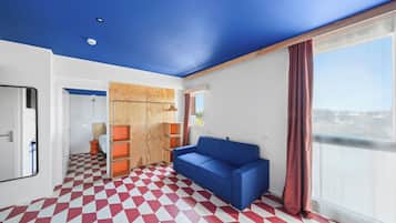 SUITE CABINE (LIT DOUBLE, CANAPÉ-LIT ET 2 LITS SUPERPOSÉS) | Coin séjour