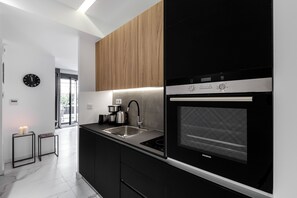 Apartamento, 2 habitaciones, no fumadores, vistas a la ciudad | Cocina básica privada | Hervidor eléctrico