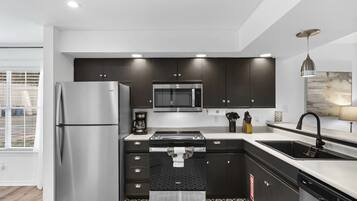 Condo, Multiple Beds, Patio (Lake Front Escape) | Private kitchen | Fridge, microwave, oven, stovetop