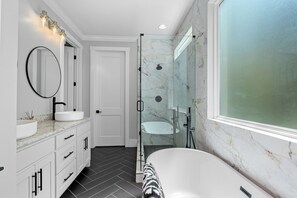 Jetted tub, hair dryer, towels, soap