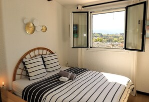 2 bedrooms, desk, iron/ironing board, travel crib