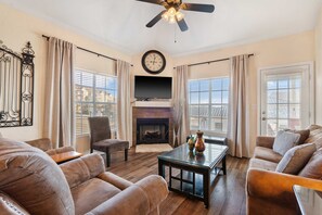 Condo, Multiple Beds, Balcony, Garden View (Meadow Brook Resort Getaway) | Living area | 42-inch flat-screen TV with digital channels, fireplace - Meadow Brook Resort Getaway (Branson)