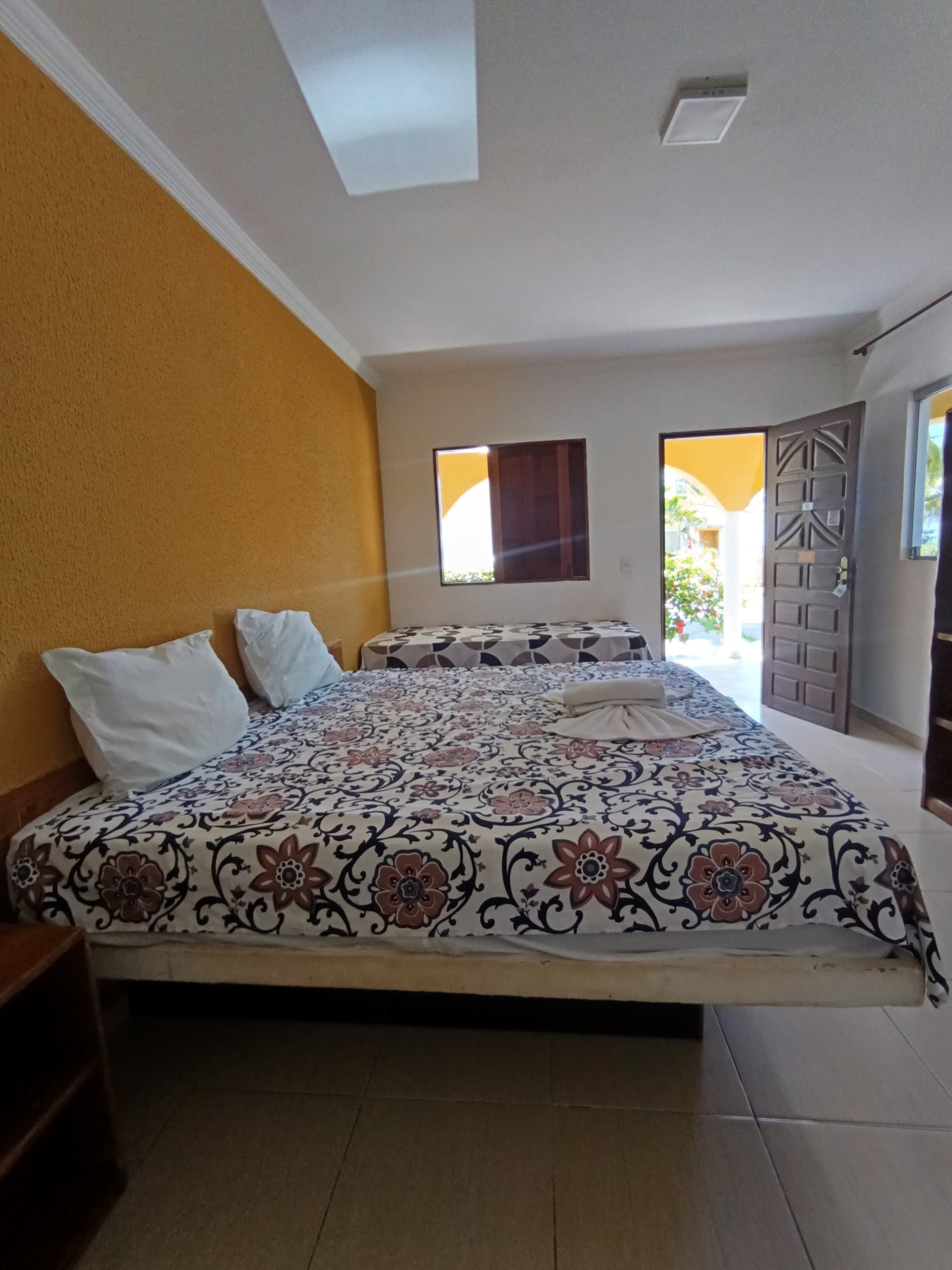 Vierpersoonskamer, uitzicht op het strand | Gratis wifi