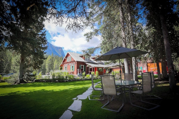 Nestled among towering evergreens, the lodge suites offer a peaceful escape with a perfect balance of rustic charm and modern comfort.$