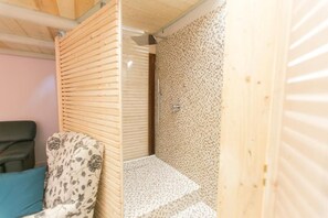 Shower, hair dryer, towels, soap
