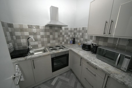 Apartment | Private kitchen | Fridge, microwave, oven, stovetop