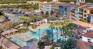 Surrounded by lounge areas and a central pool, this hotel offers a relaxing atmosphere.