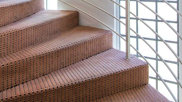 A spiral staircase with a metal railing, leading to a higher floor. - Modern Apartment - AC- 1br-2p- Geneva (Geneva)
