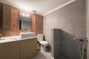 Hair dryer, towels, soap, shampoo