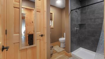 Shower, towels, soap, toilet paper