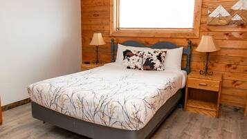 1 bedroom, desk, iron/ironing board, travel crib