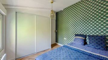 2 chambres, fer et planche à repasser, Wi-Fi, draps fournis