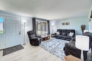 TV, fireplace, books