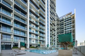 Pool - Setting Away from Major Retail Areas with Pool View 1BR, Binghatti Amber, Jumeirah Village Circle (Dubai)